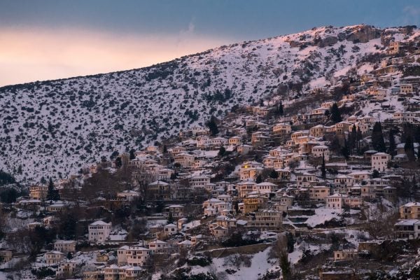 Makrynitsa village located in west Pelion in central Greece, covered by snow in winter during sunset!